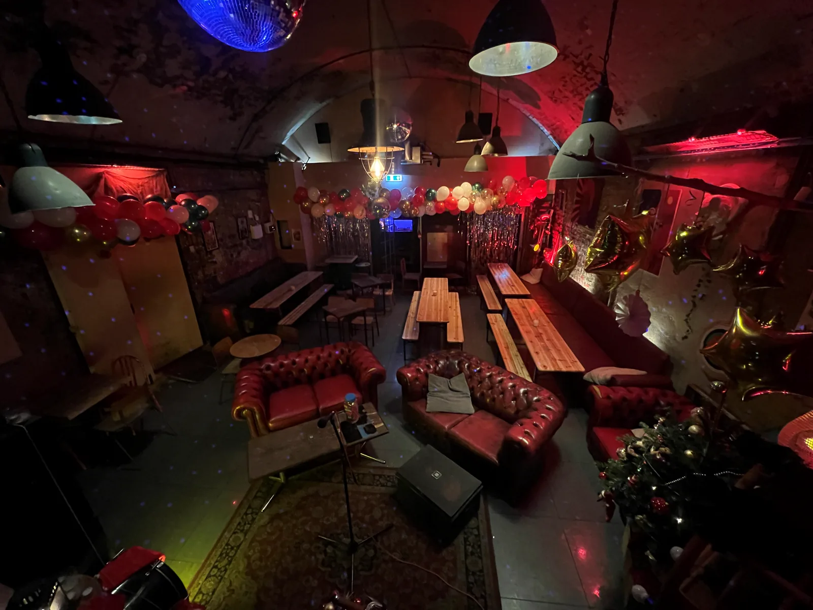 A workshop in progress at Love Shack London, people gathered around a hands-on session