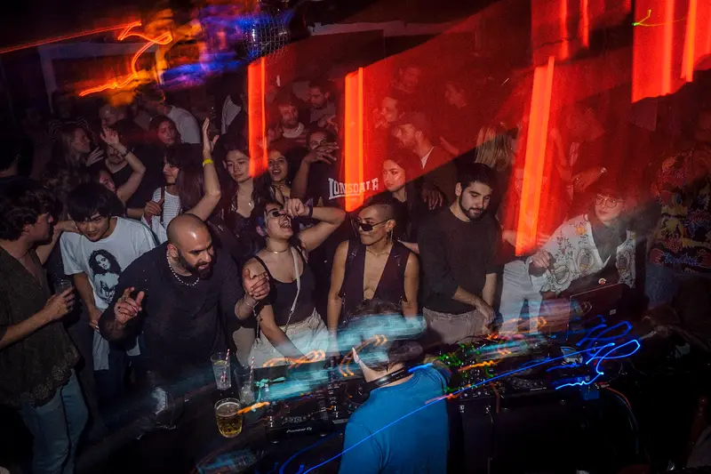 A private party at Love Shack with DJ and dance floor packed with guests